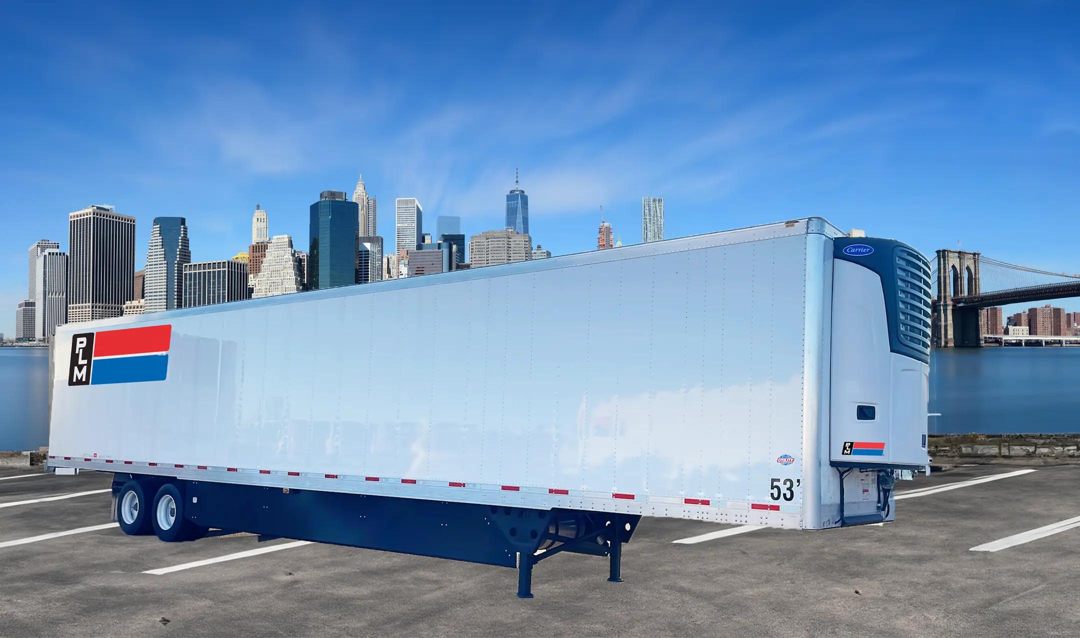 reefer trailers against a city skyline
